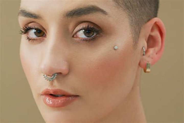 Cute lady hospitalized after going for a back dimple piercing