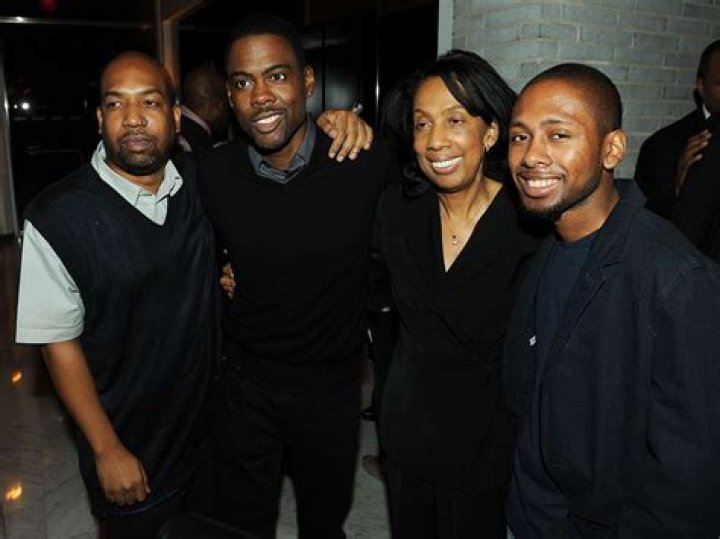 Which of Chris Rock's siblings died?